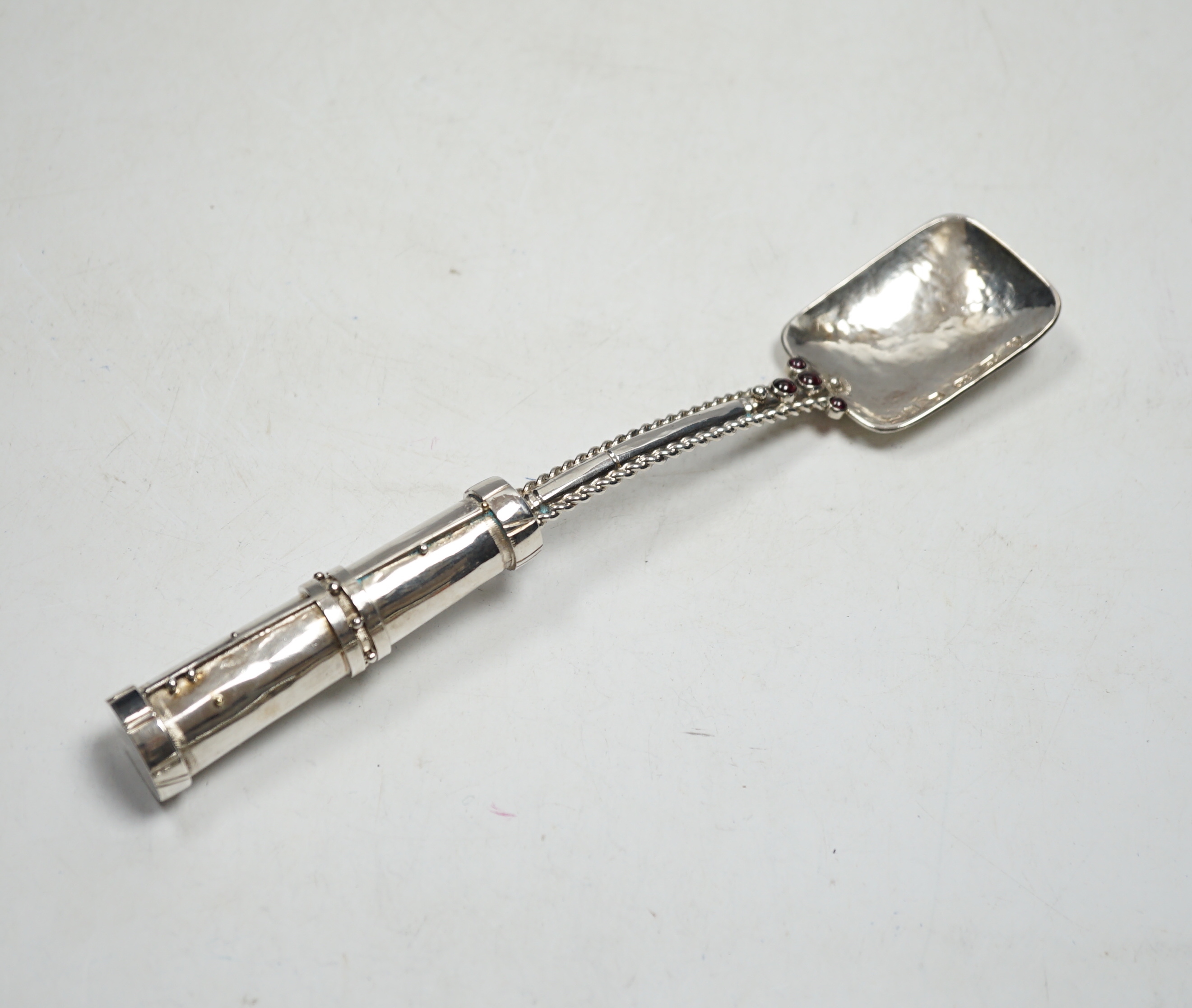 A modern Arts & Crafts silver and four stone cabochon garnet set spoon, maker HNG, London, 2013, 23cm, gross weight 115 grams.